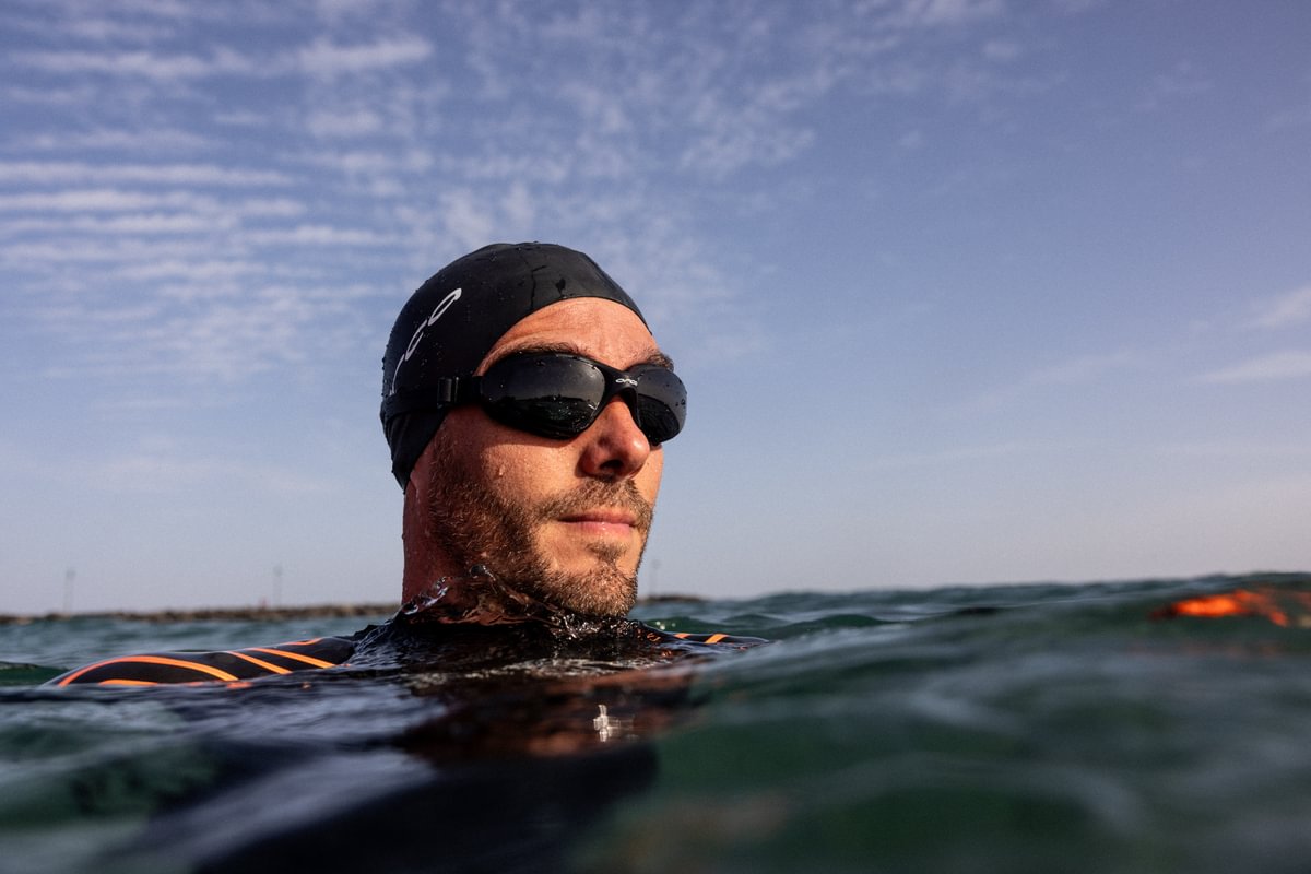 man open water swimming in orca swim goggles