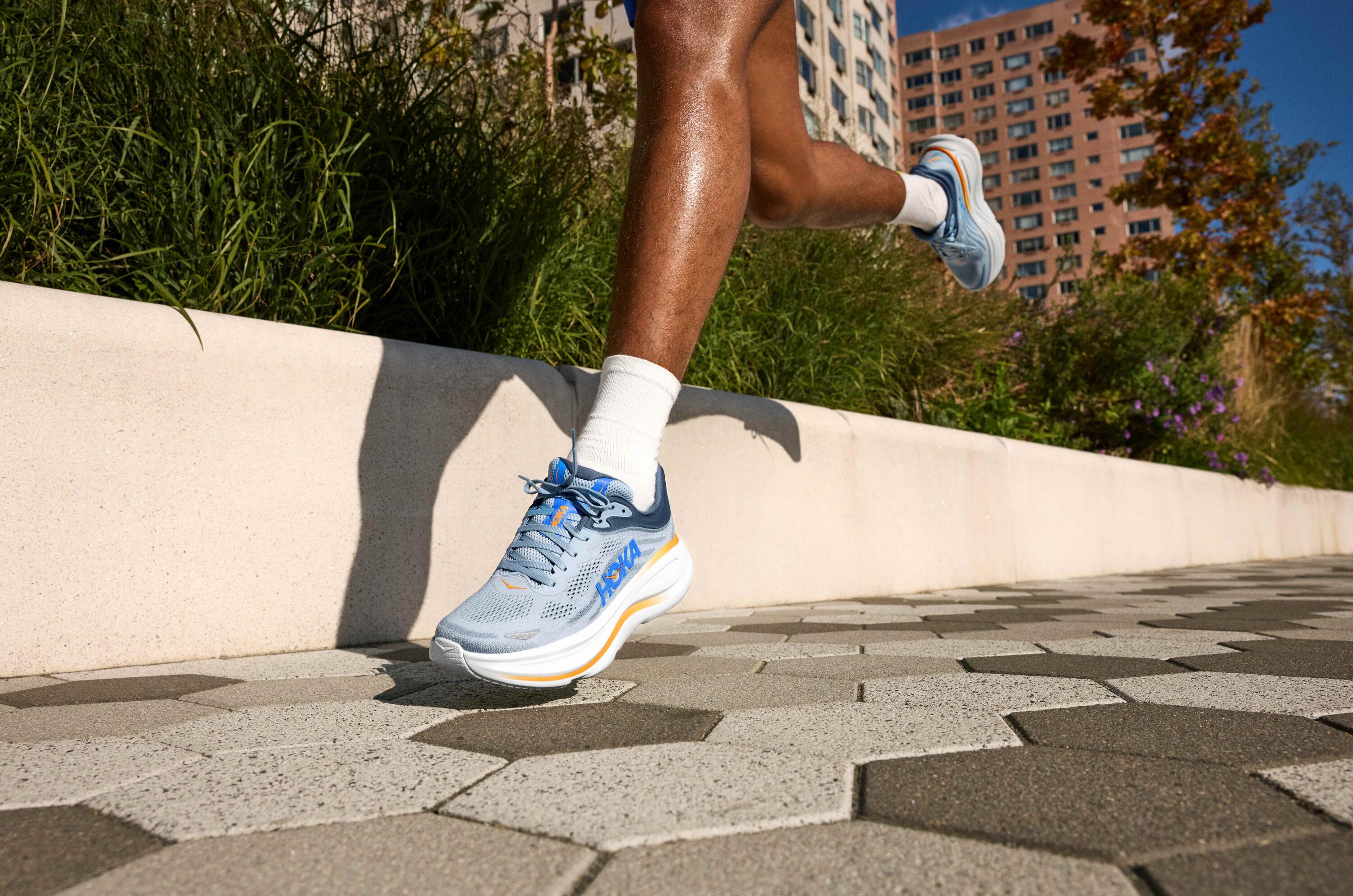 man running in Hoka Bondi 9 cushioned run shoe