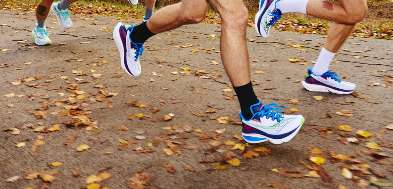 group of people wearing Saucony runners