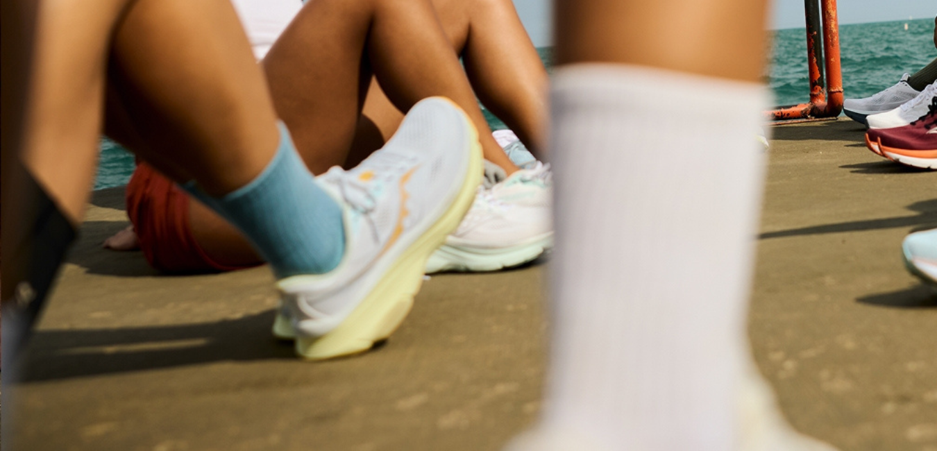 group of people wearing Saucony runners