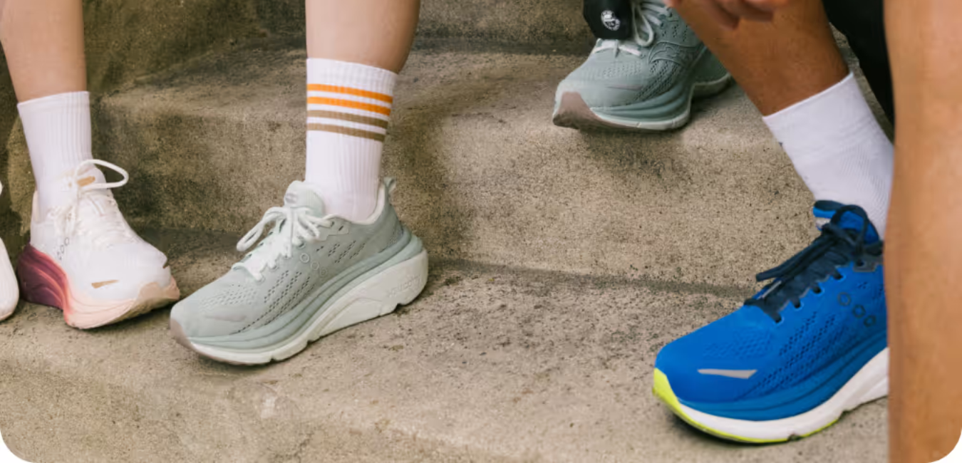 group of people wearing Saucony runners
