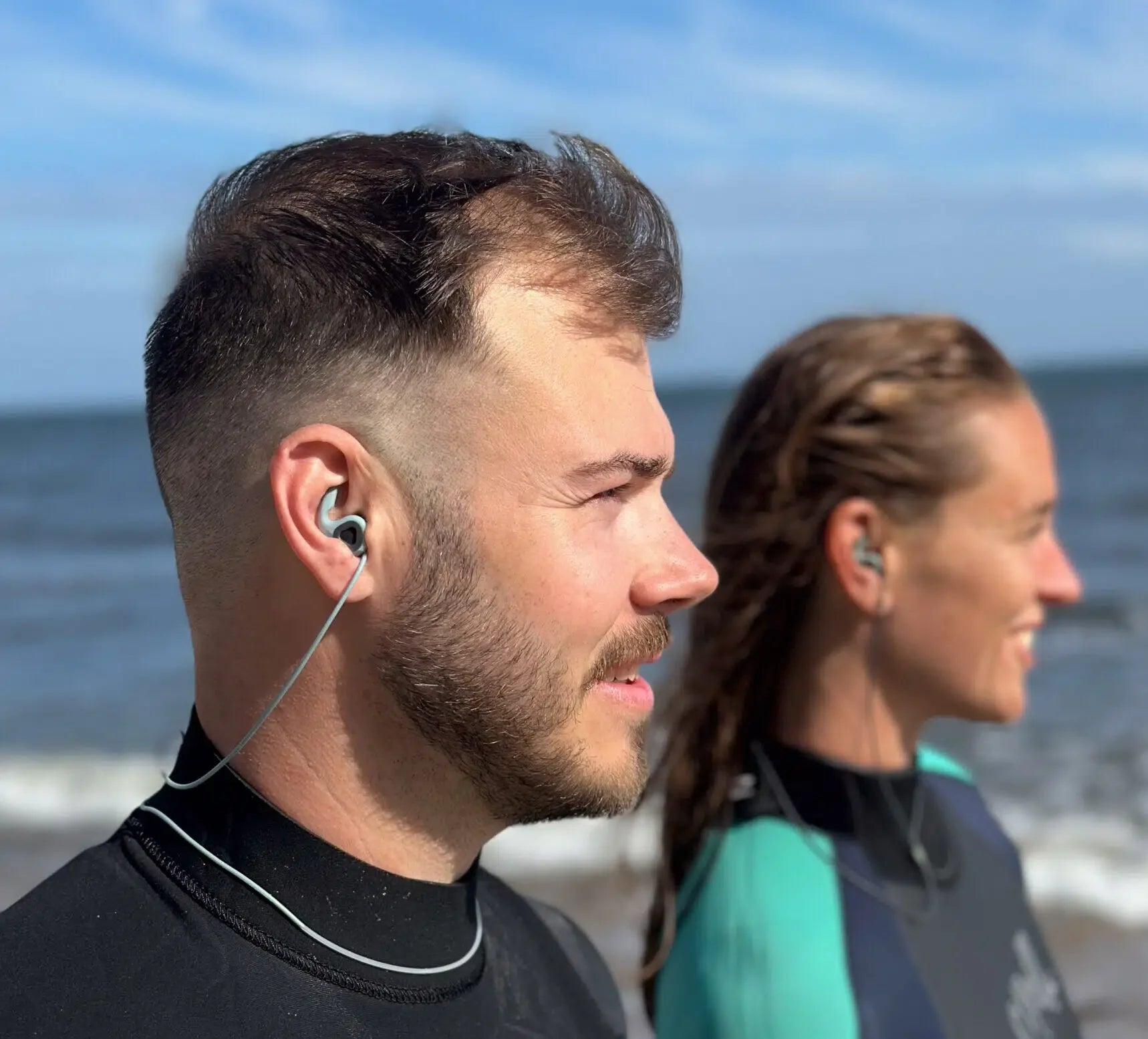 swimmers wearing surf ears to prevent swimmers ear infections