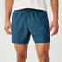 Man wearing Brooks Dash Reflective Shorts, showing front