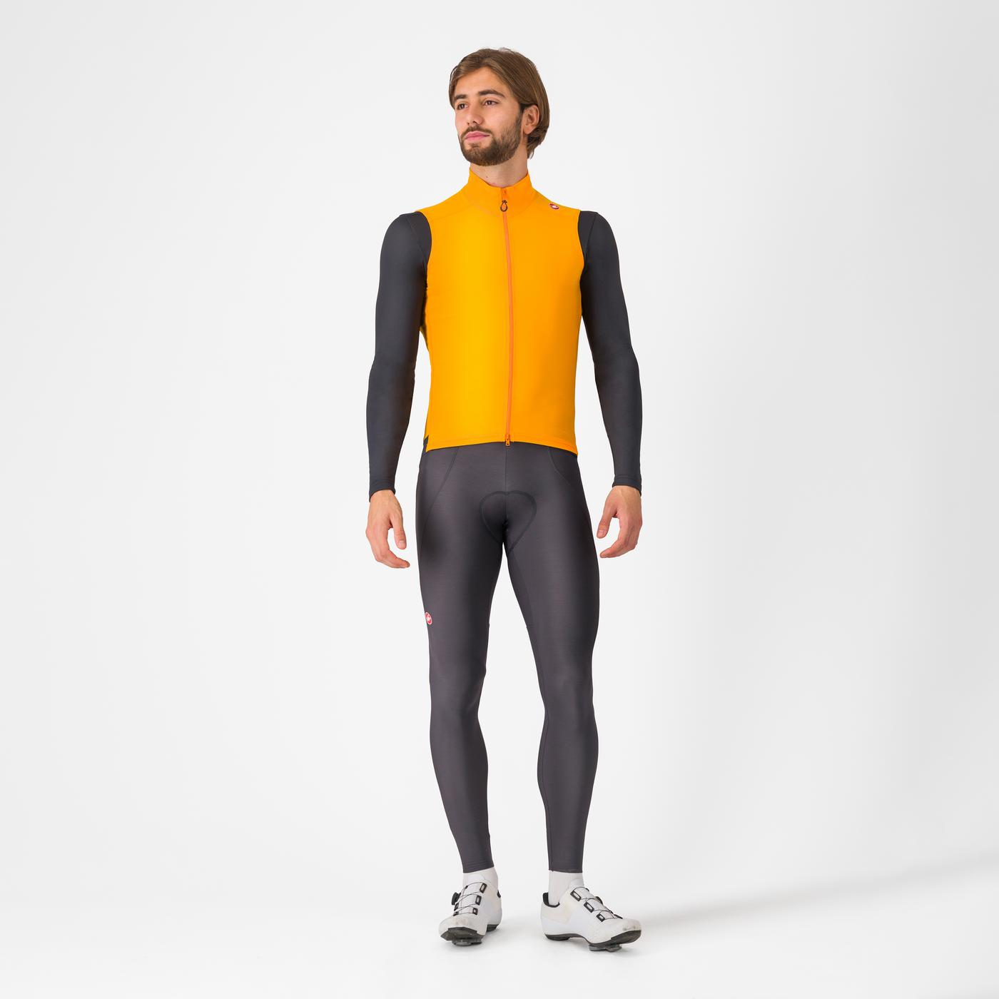 Man wearing Castelli Espresso Vest in orange colour, with other castelli cycling gear