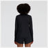woman wearing NB athletics long sleeve run top in black, showing back coverage