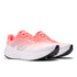 New Balance 1080 Mens Pair of red and white running shoes on a white background