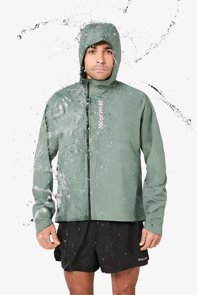 Nnormal trail rain jacket model with water