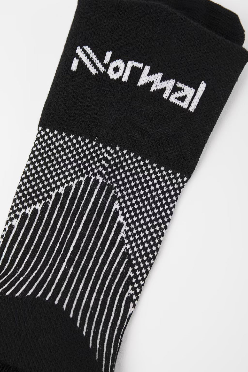Close up of Nnormal running sock, black and white