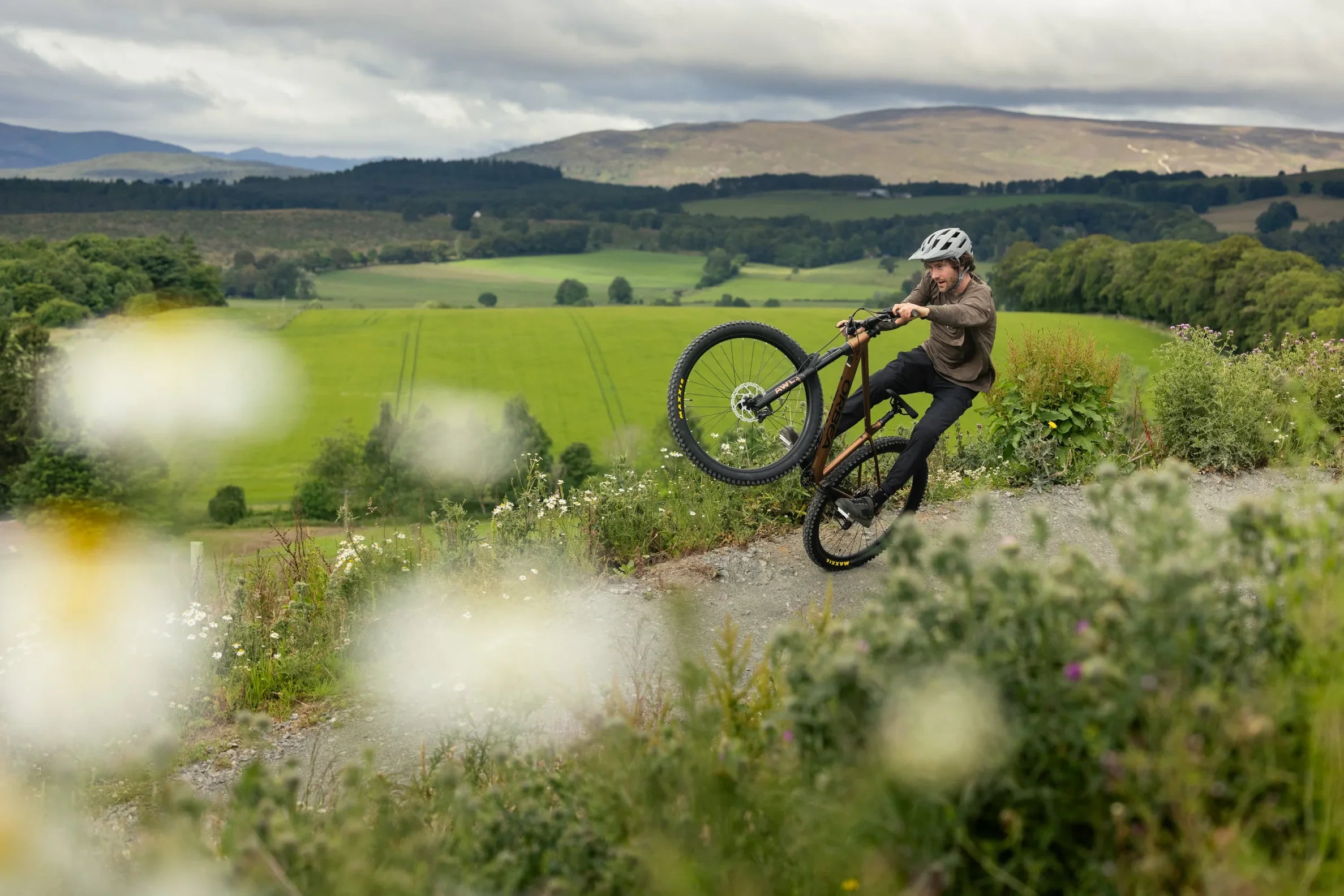 Man riding Orbea Laufey hardtail mountain bike on the trails
