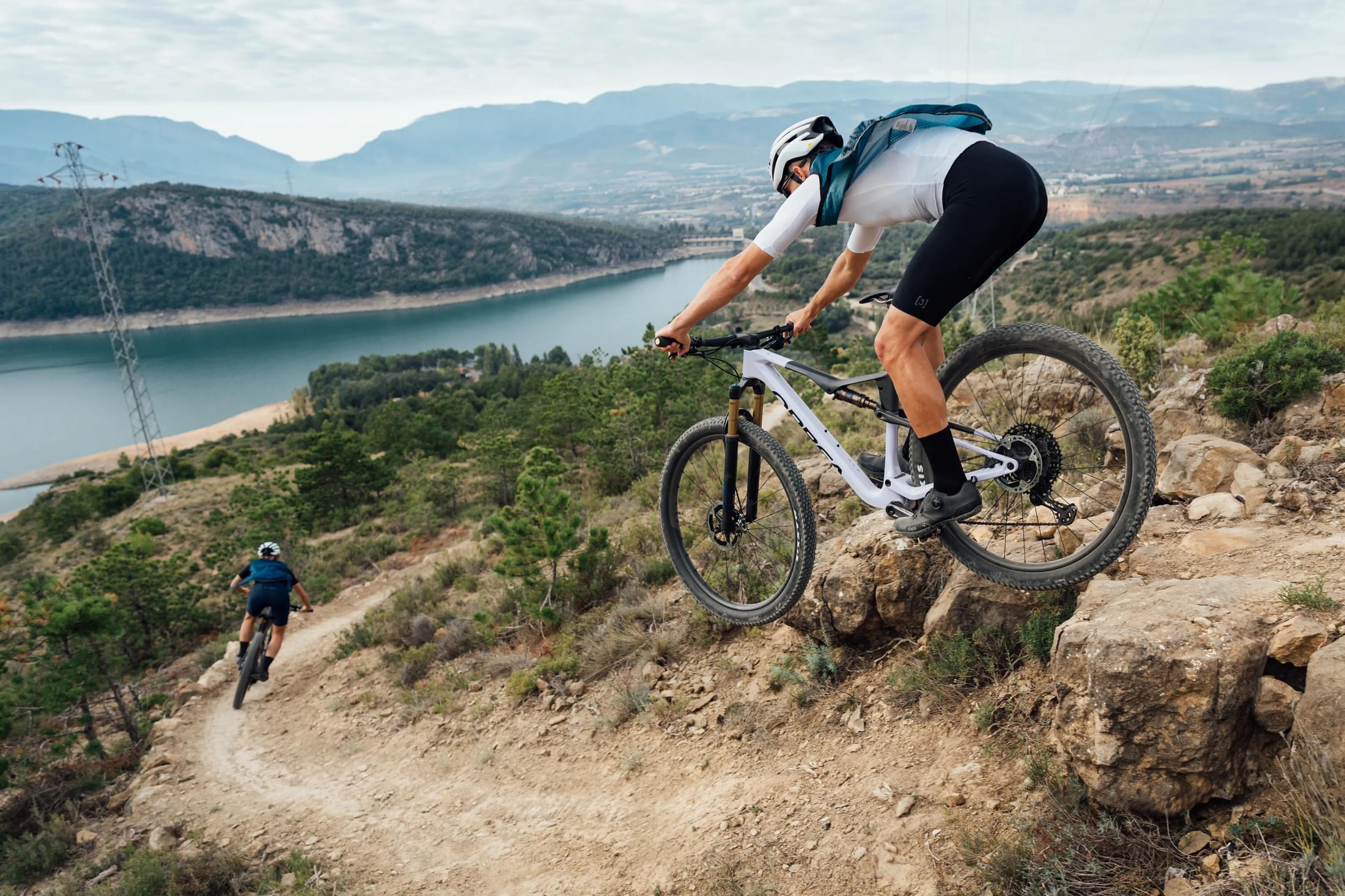 People cycling cross country on an orbea oiz mountain bike