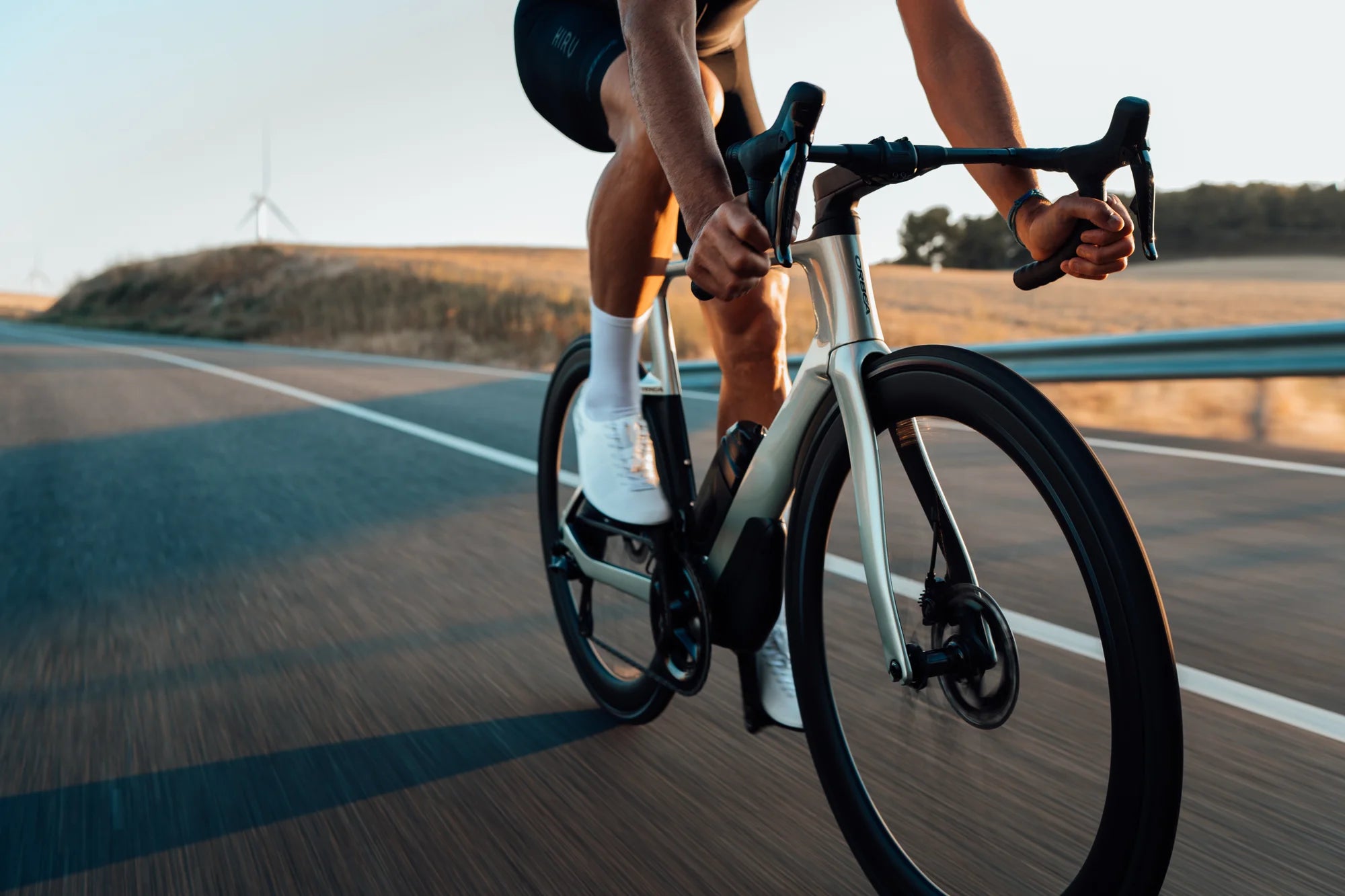 Man cycling the orbea aero road bike, lightweight aero bike for speed