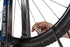 parktool triple spoke wrench, wrench tightening spoke on wheel