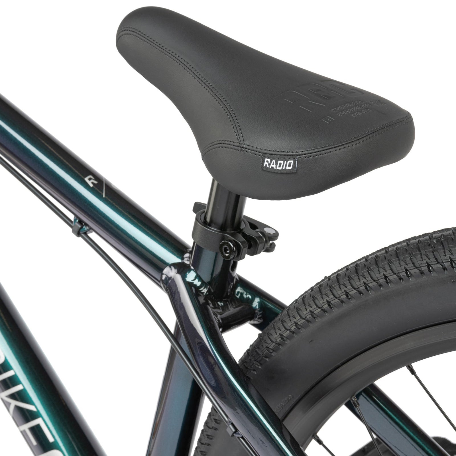 Close-up of a bicycle seat with 'Radio' branding on griffin dirt bike