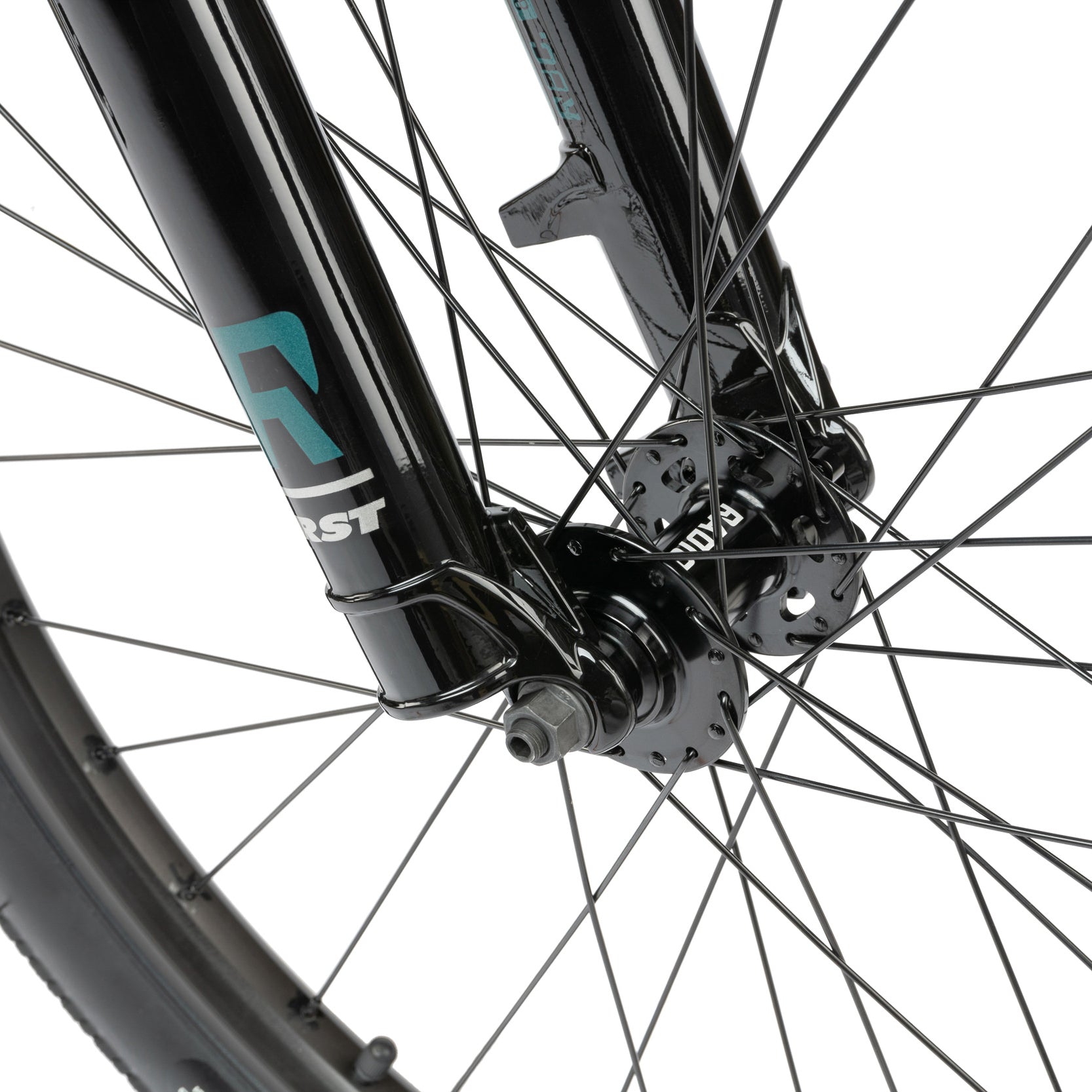 Green dirt jumper from the Radio Bike Company, close up of bike wheel