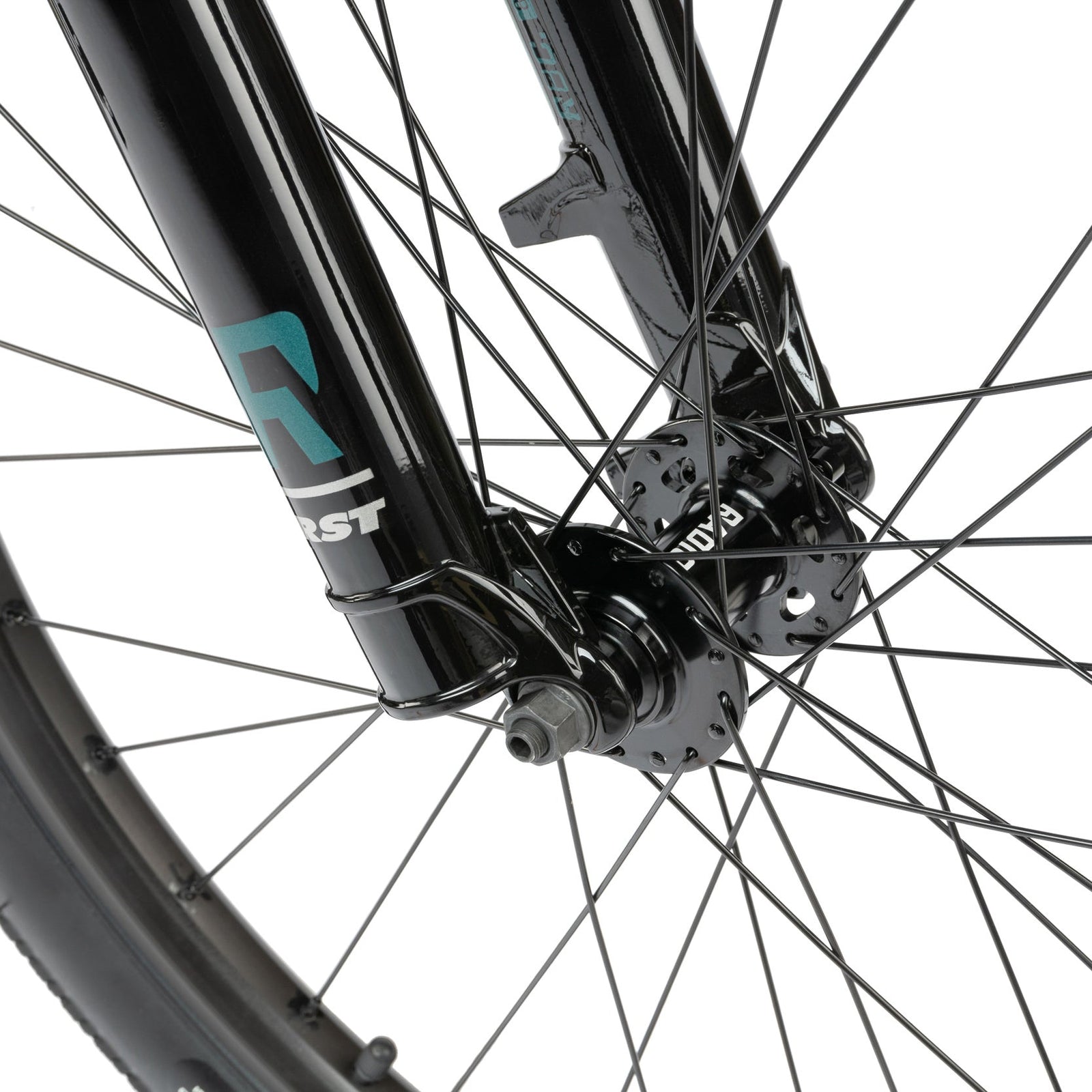 Green dirt jumper from the Radio Bike Company, close up of bike wheel