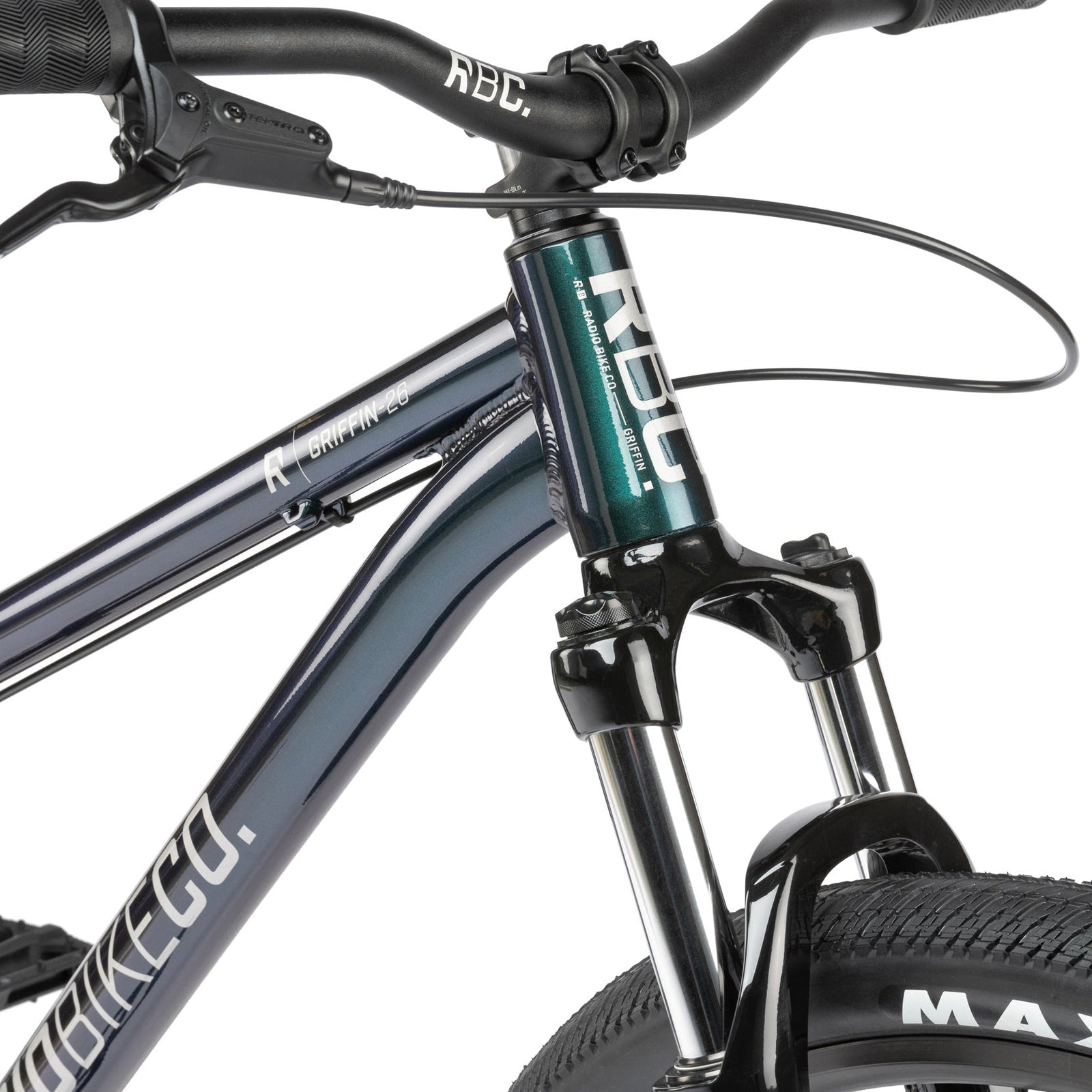 Green dirt jumper from the Radio Bike Company, close up of suspension fork