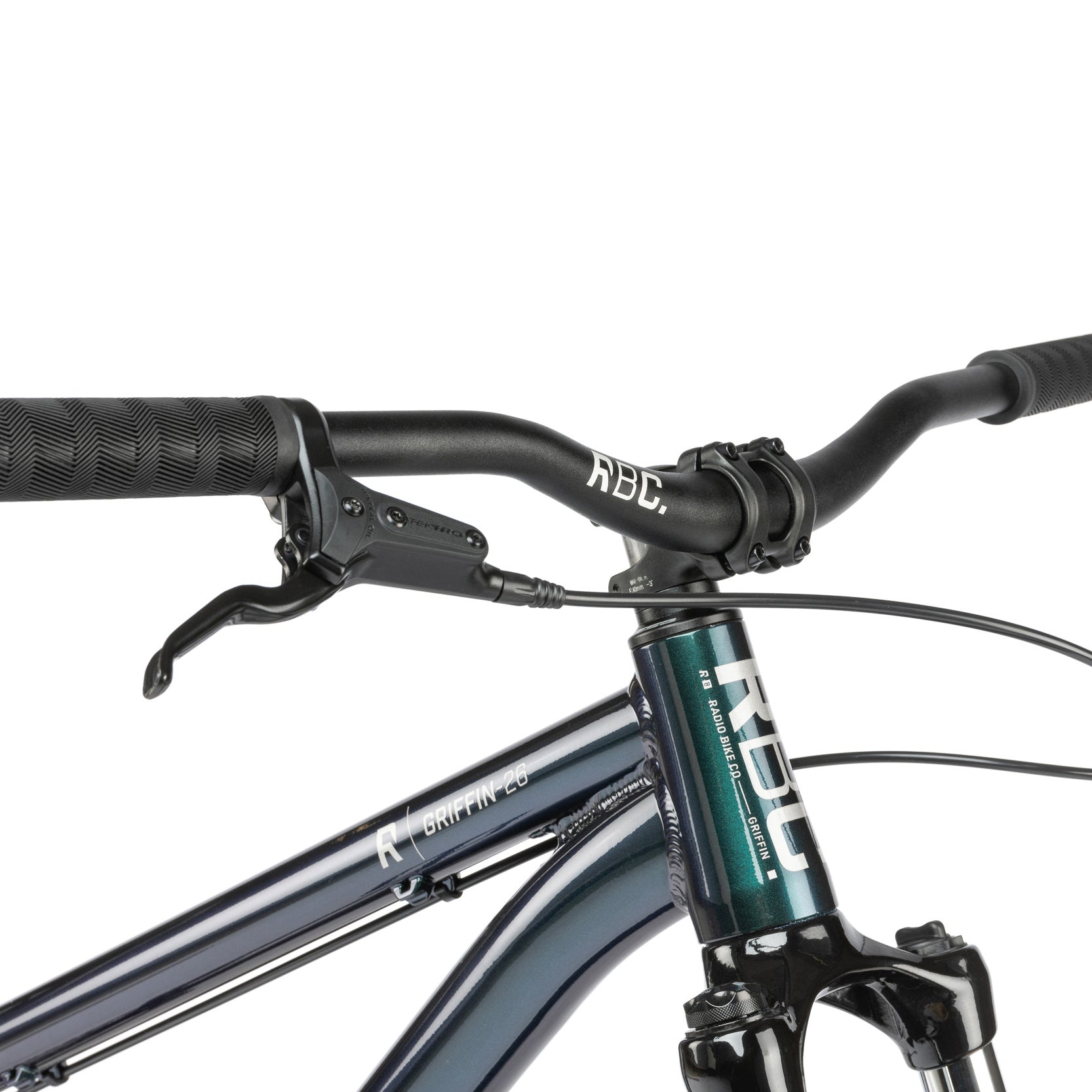 Green dirt jumper from the Radio Bike Company, close up of handlebar