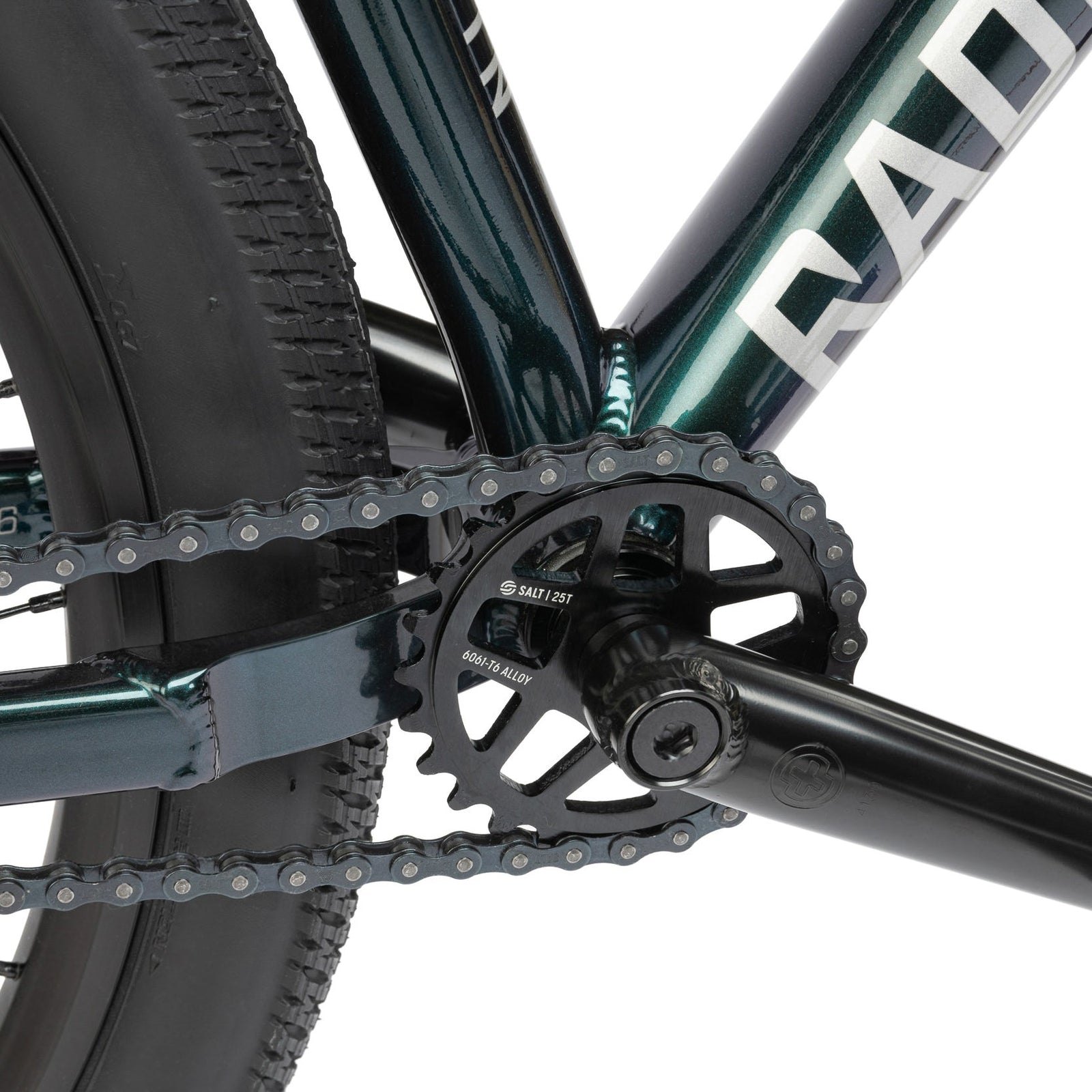 Green dirt jumper from the Radio Bike Company, close up of chain and gear system