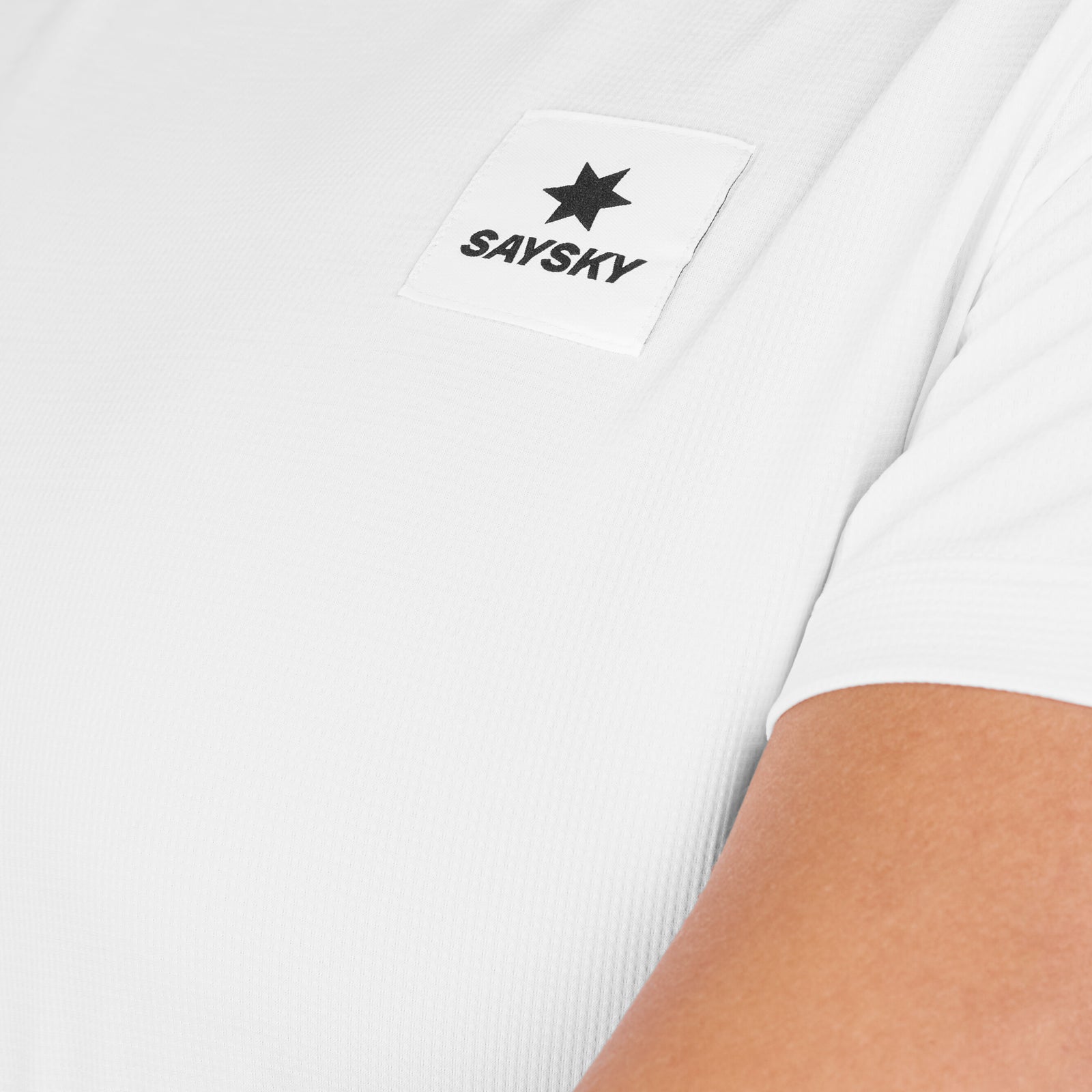 logo view of white saysky womens clean combat pro tshirt