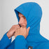 Man wearing SAYSKY Clean Pace Flex Hooded Running Jacket in blue, showing elasticated hood