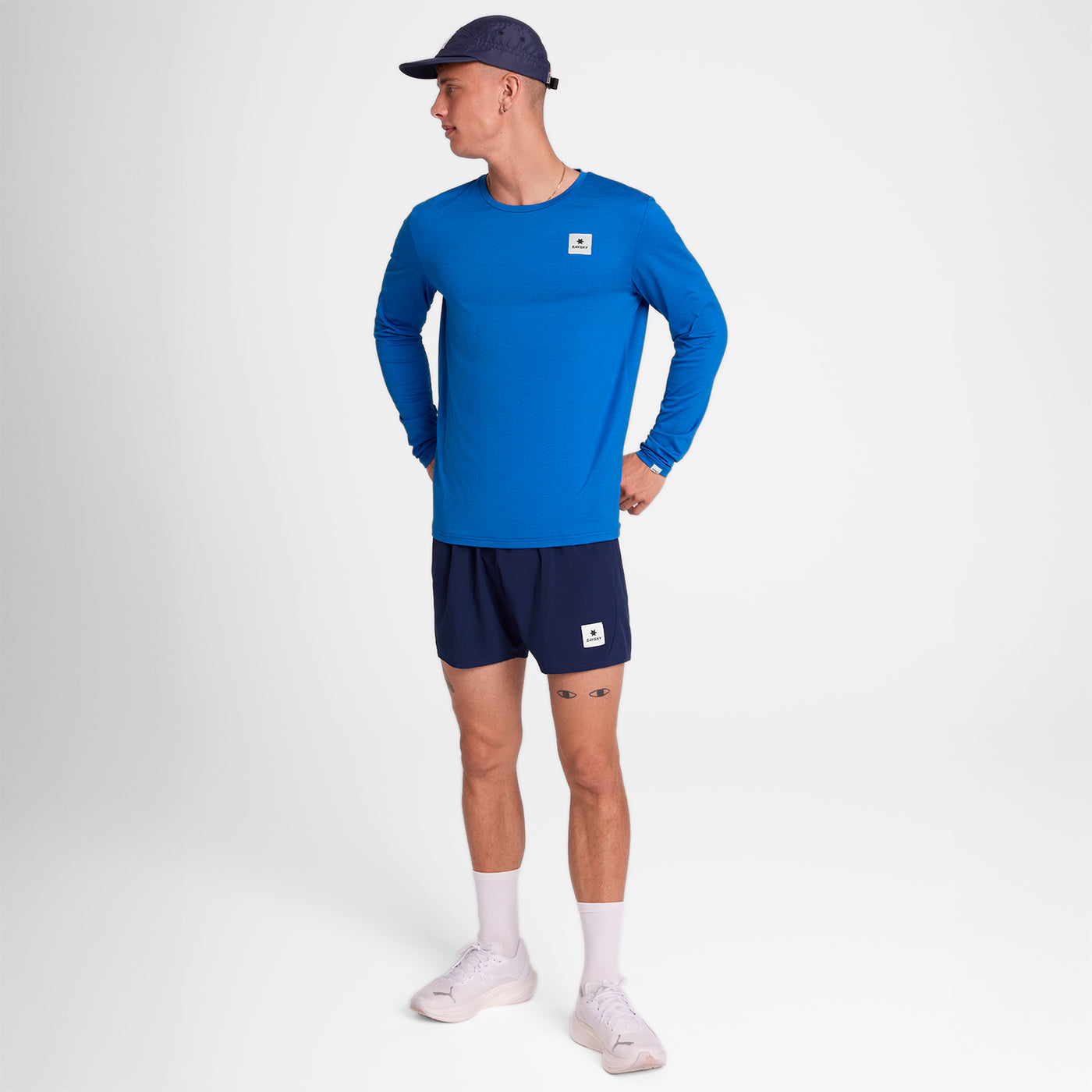 Man wearing SAYSKY Clean Pace long sleeve run top in blue