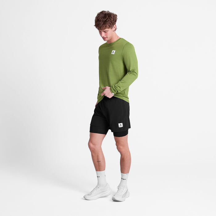 saysky long sleeve running top for men in green, breathable, quick-drying running top, full body shot of man wearing top and black shorts