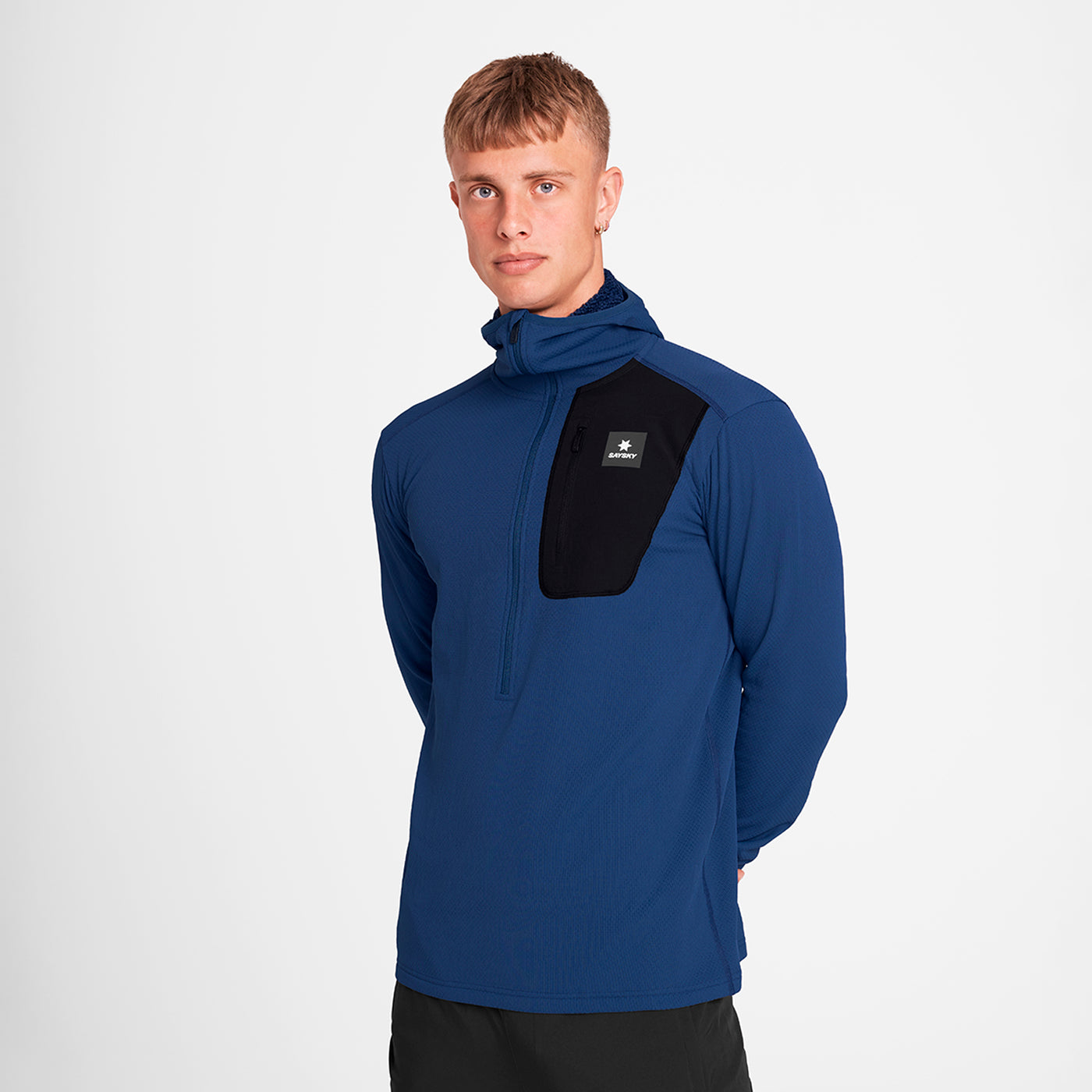 man wearing SAYSKY long sleeve, blue and black, fleece run top 