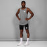 man wearing SAYSKY combat 9 inch run shorts in black, front view with logo