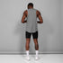 man wearing SAYSKY combat 9 inch run shorts in black, back view