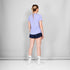 Woman wearing saysky logo combat pro t-shirt in purple colour, back view