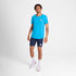 Man wearing Blue SAYSKY run tee shirt with small logo on front