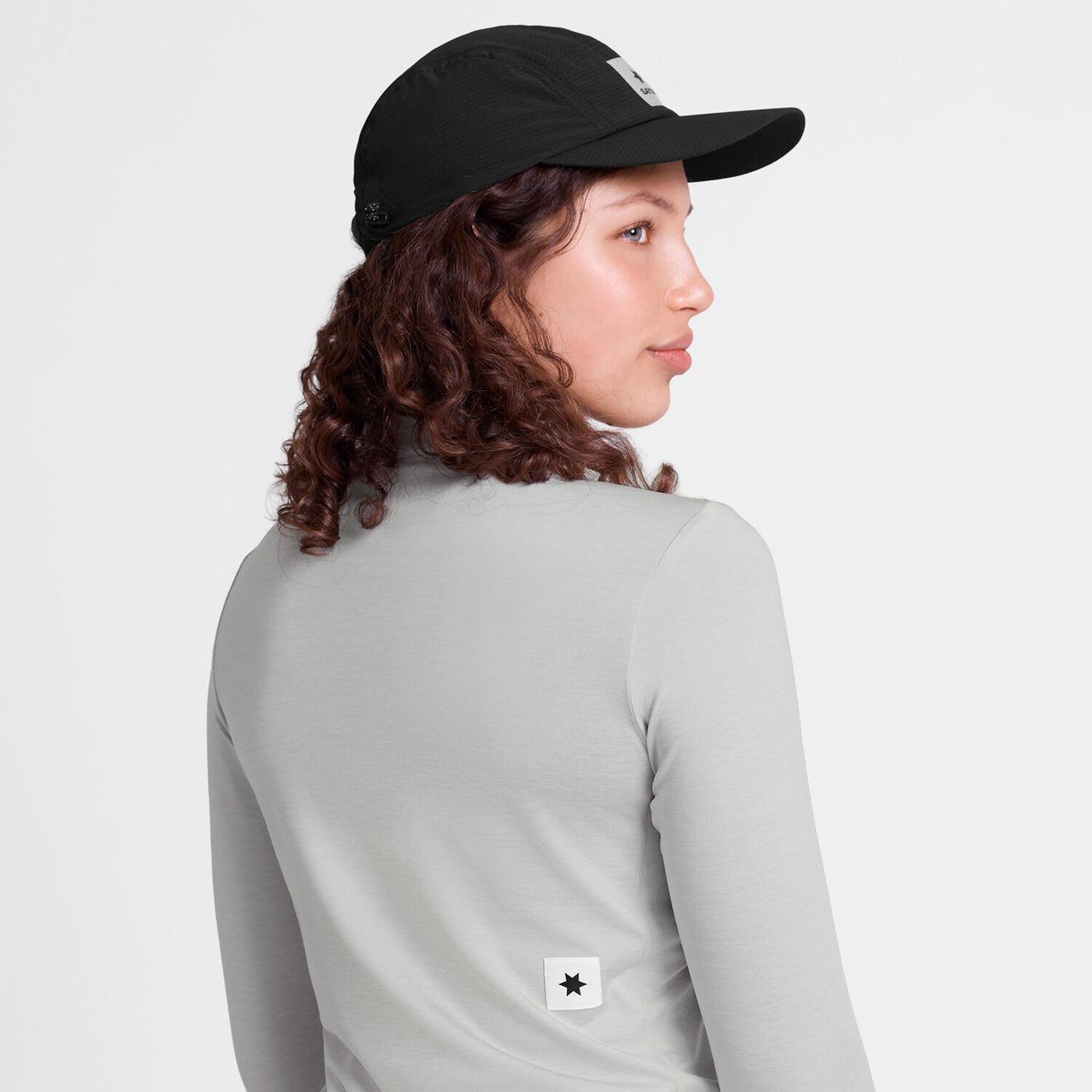 saysky womens pace 1/2 zip long sleeve, lightweight breathable half zip top for running, light grey colour, back view of woman wearing grey saysky top