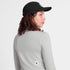 saysky womens pace 1/2 zip long sleeve, lightweight breathable half zip top for running, light grey colour, back view of woman wearing grey saysky top