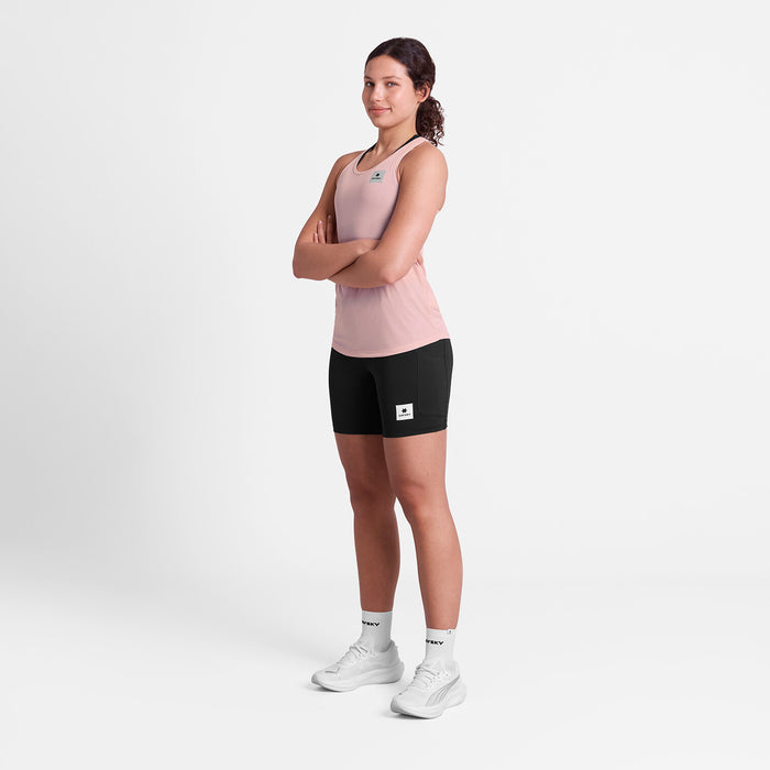 SAYSKY reactive flow pink singlet tank top for women, ultra-light, race tank, full body view of women wearing SAYSKY tank with black shorts