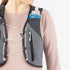 Salomon ADV Skin 12, 12 liter running vest, dark grey colour with dark green accents, close up of running vest chest zipper on model