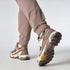 woman wearing Salomon X Ultra Goretex Hiking shoe in Burlwood / French Roast / Rattan colour