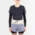 salomon pulse belt, trail running belt with zipper pocket, cream white colour with grey details, women wearing belt from the front standing 