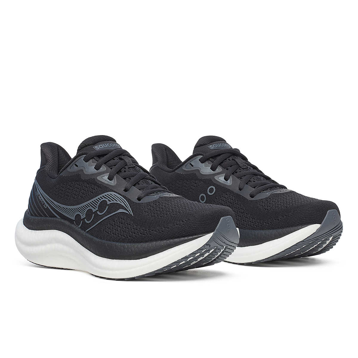 Pair of womens saucony triumph 23 running trainers shoes black white 