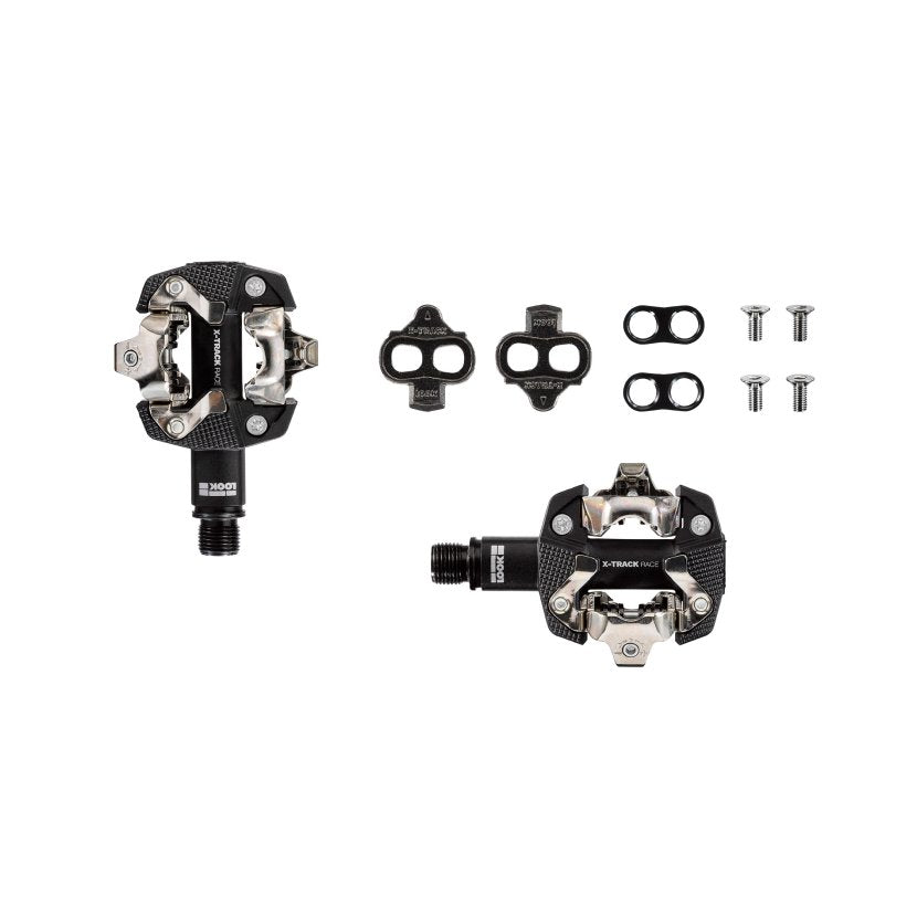 x track race pedal box, clipless mtb racing pedals, pedals laid out flat with all parts detached