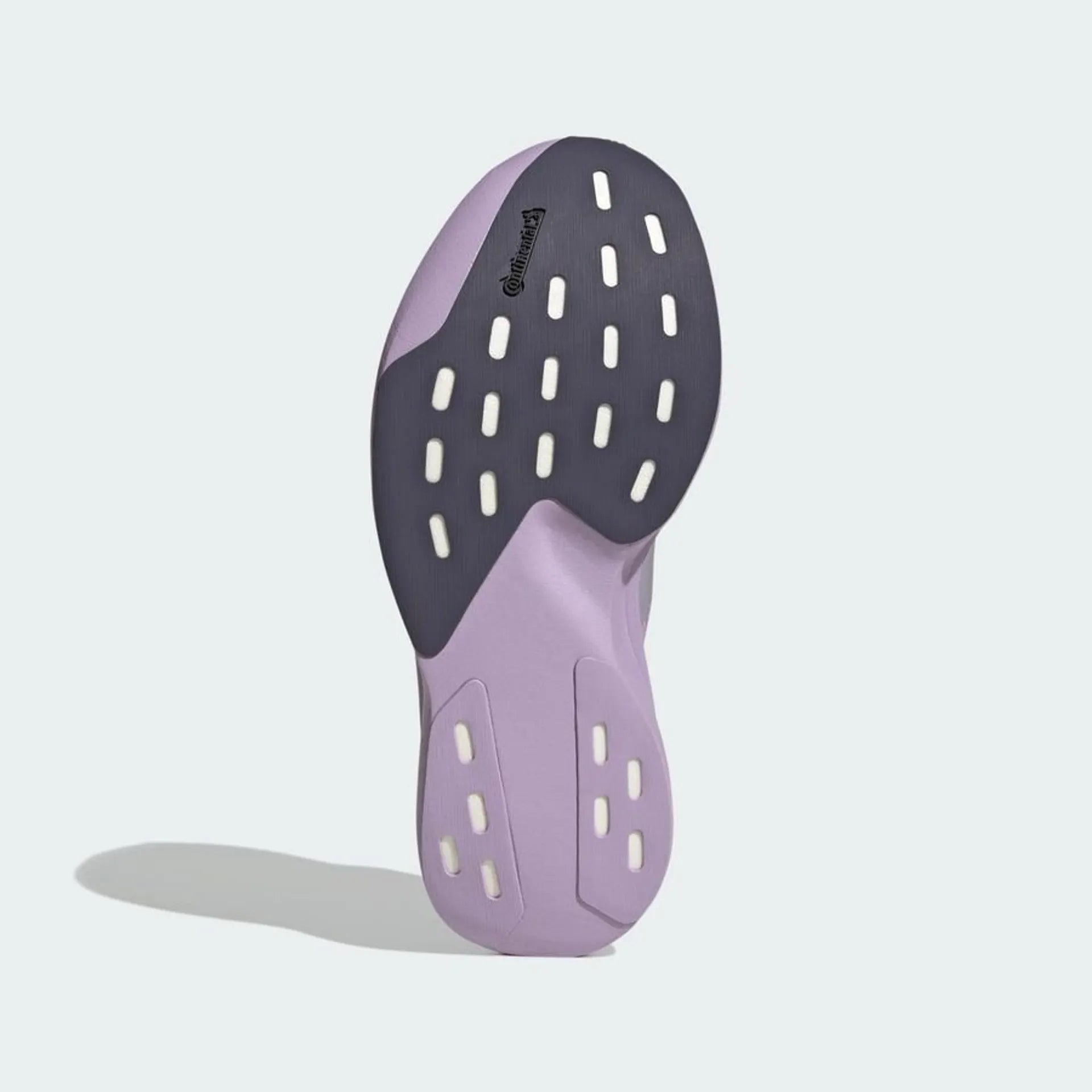 sole of adidas adizero evo sl running shoe for women in purple with metallic stripes