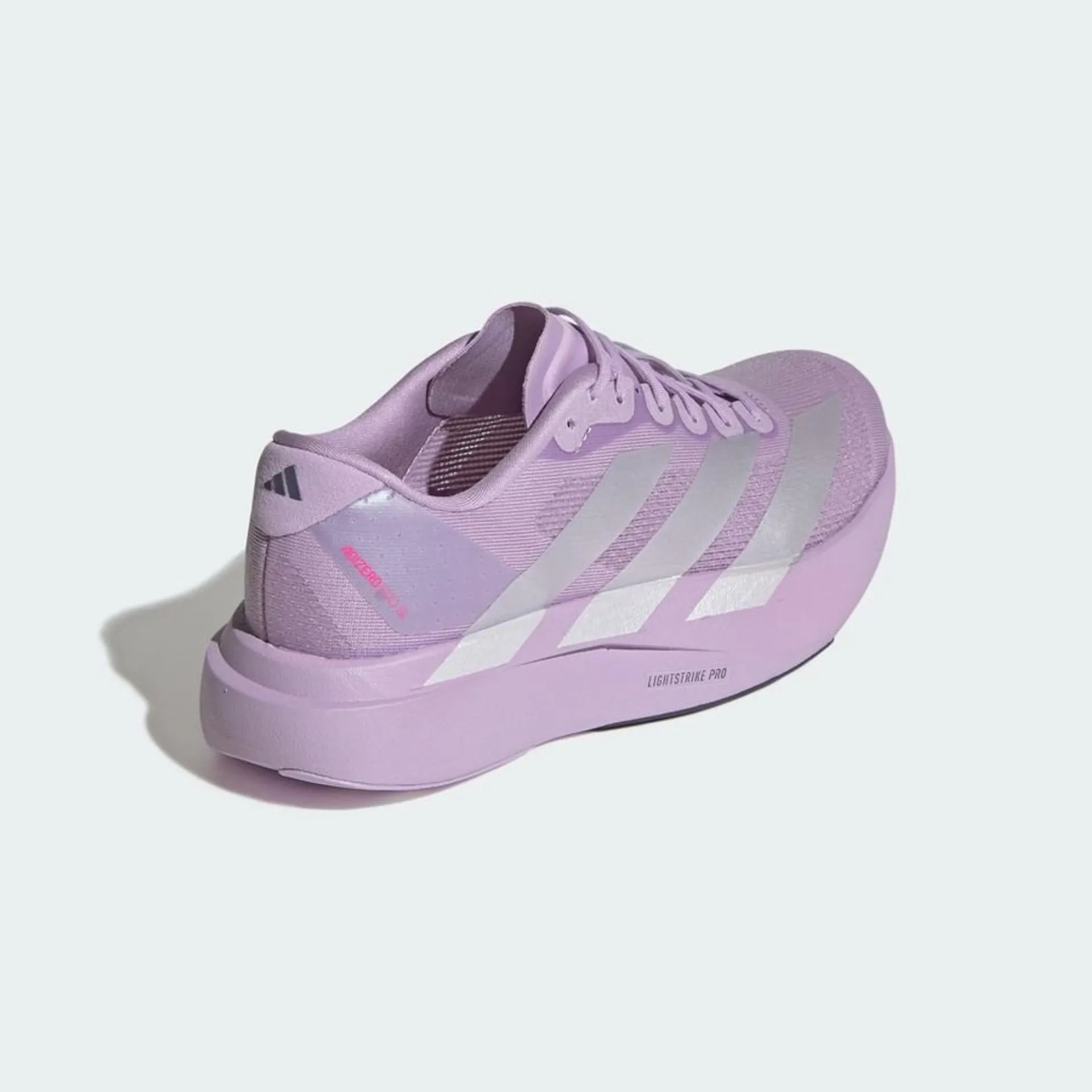 side view of adidas adizero evo sl running shoe for women in purple with metallic stripes