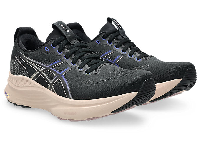 pair of asics gel kayano in black for women