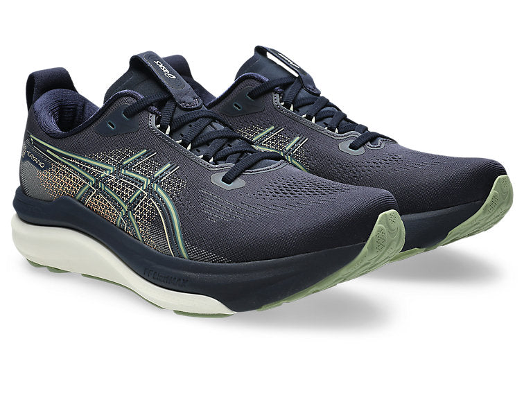 pair of asics gel kayano 33 running shoes for men in midnight blue and khaki colour