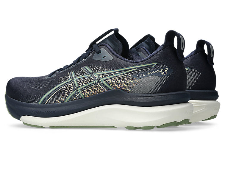 pair of asics gel kayano 33 running shoes for men in midnight blue and khaki colour