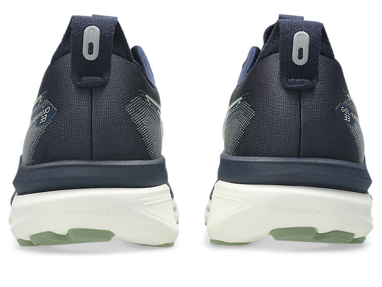 back of a pair of asics gel kayano 33 running shoes for men in midnight blue and khaki colour