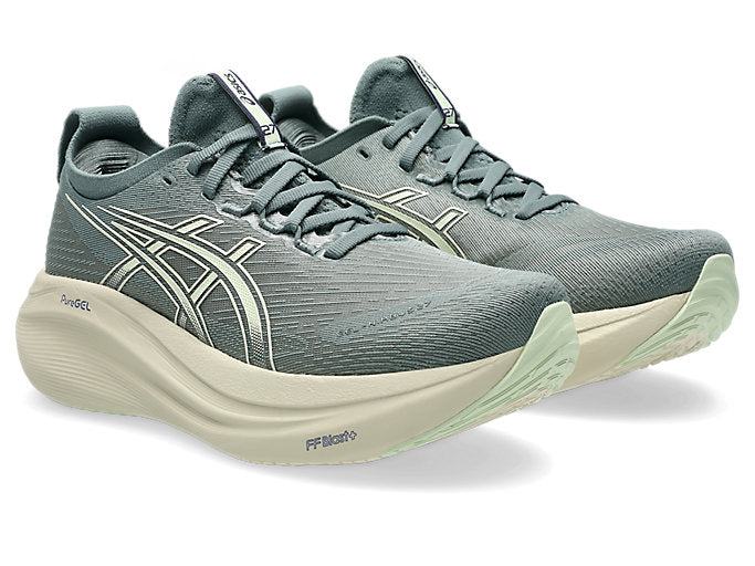pair of greyish green asics running shoe with light green sole