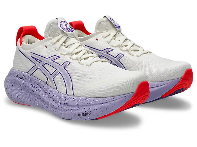 pair of white and purple asics gel nimbus running shoe with purple and white speckles and red details