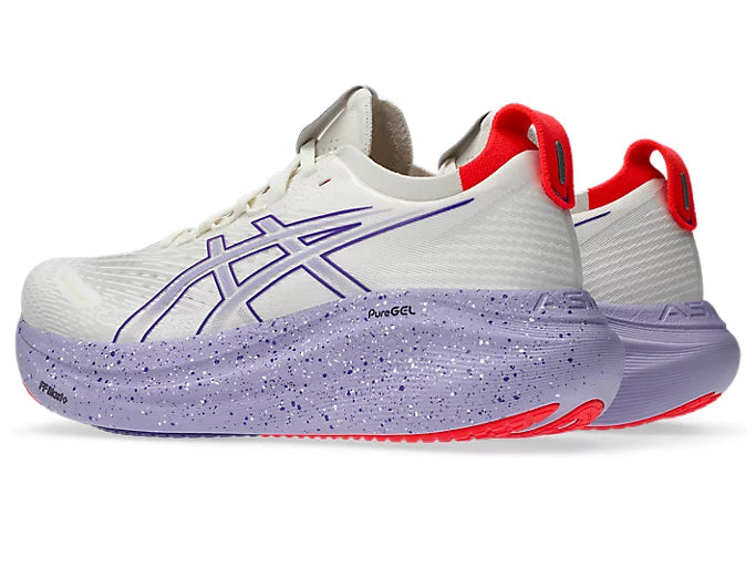 white and purple asics gel nimbus running shoe with purple and white speckles and red heel straps