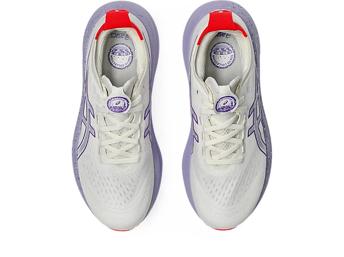 white and purple asics gel nimbus running shoe top of shoe