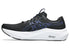asics gt-2000 14 for men, lightweight cushioned running and walking shoe with gentle support, white and teal sole with dark black and navy upper colour, inside side profile of shoe with white background